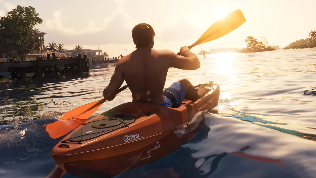 Jason paddling a red Crest kayak away from a Keys dock into the low sun