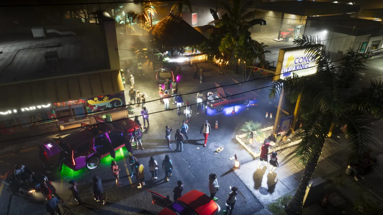 A night street party with cars and a crowd under neon, art from Rockstar's GTA 6 Music page