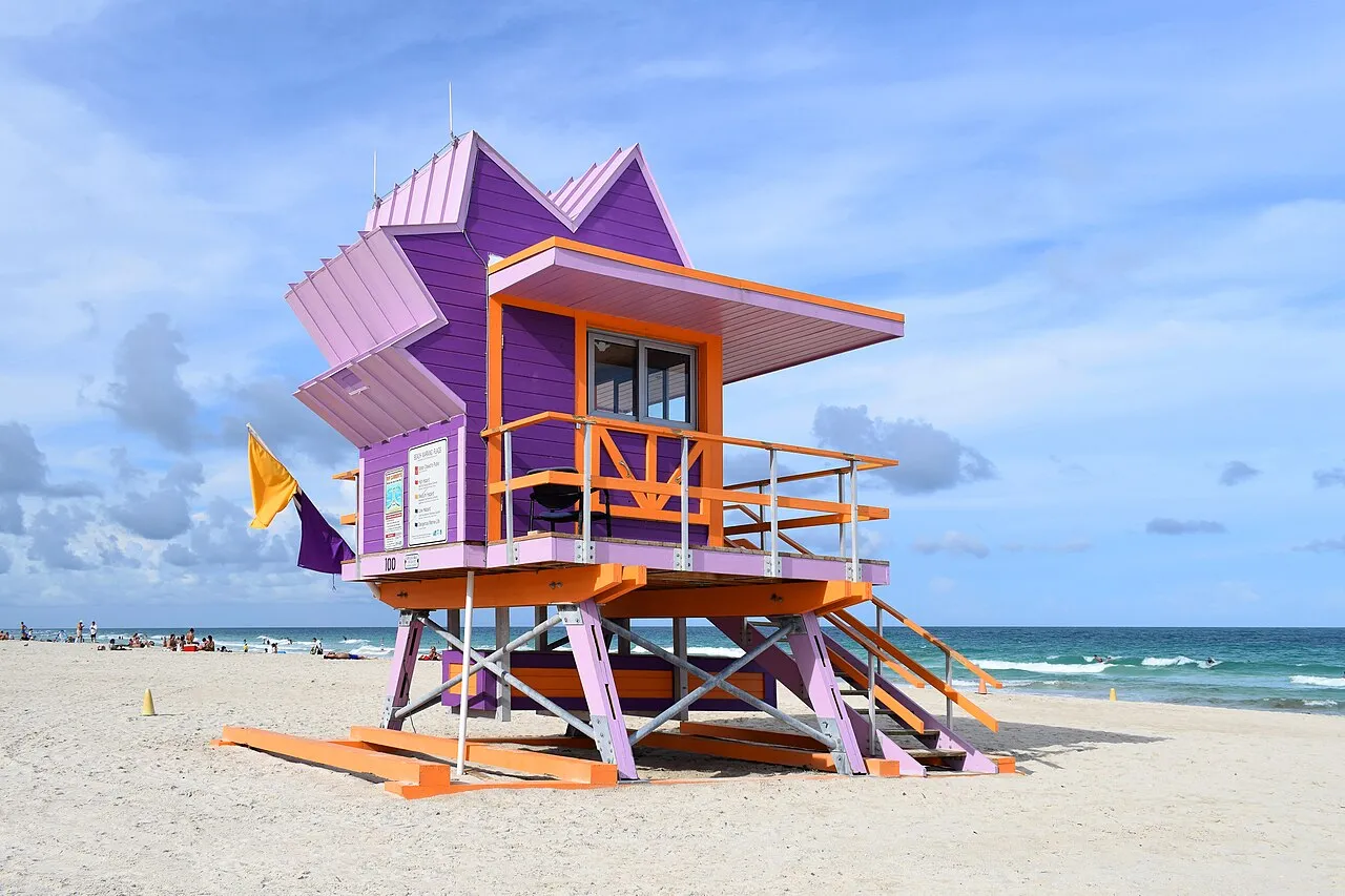 A lifeguard tower on Vice City beach, and a real one on South Beach. Miami Beach has dozens of these art-deco stands, each painted differently, and they are the single most recognisable object on that coastline.